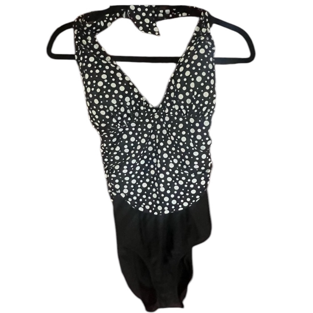 Venus one piece suit size 12 excellent condition. Deep V neck ties at neck
